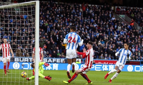 Tom Ince slots the ball home to give Huddersfield Town the lead.