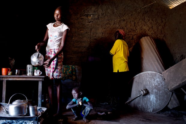 Helena, 16, makes tea to sell in her home in Rumbek, South Sudan