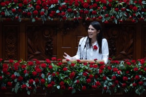 Portuguese leader of the Left Block Mariana Mortagua delivers a speech during the commemorative session at the Portuguese parliament