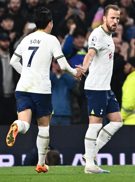 Son Heung-min celebrates with Harry Kane after scoring the equaliser against Manchester United, set up by Kane