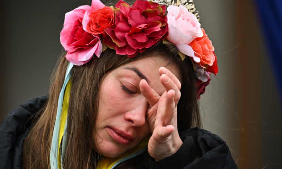 Stand with Ukraine Rally Is Held In Edinburgh<br>EDINBURGH, SCOTLAND - MARCH 03: A Ukrainian woman reacts as members of the public show their support for Ukraine outside the Scottish Parliament on March 3, 2022 in Edinburgh, Scotland. Russia invaded neighbouring Ukraine on 24th February 2022, its actions have met with worldwide condemnation with rallies, protests and peace marches taking place in cities across the globe. (Photo by Jeff J Mitchell/Getty Images)