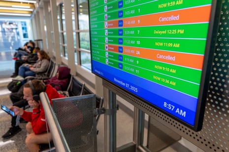 Travelers wait for their flights amid nationwide cancellations and delays at Ronald Reagan Washington National Airport in Arlington, Virginia, USA, 07 November 2025.