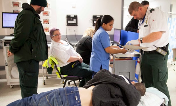 Medics with a patient in an A&E ward in Stoke