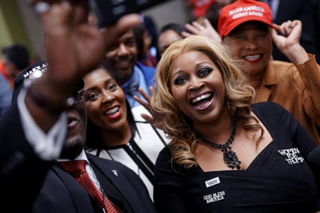Attendees wearing pro-Trump clothing and accessories pose for a wefie at U.S President Donald Trump’s Black Voices for Trump Coalition rollout event in Atlanta, Georgia, U.S. November 8, 2019. REUTERS/Elijah Nouvelage
