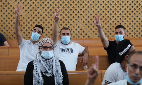 Palestinian residents of the East Jerusalem neighbourhood of Sheikh Jarrah attend a discussion at the Israeli supreme court