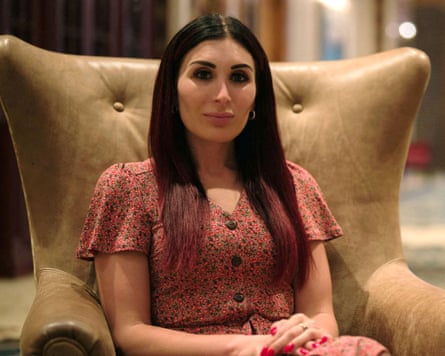 Loomer sat in leather chair