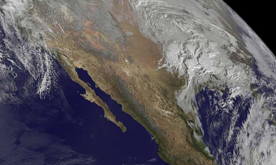 A Nasa satellite image showing the snow storm looming over the US east coast.