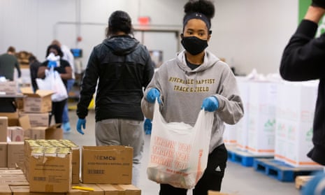 Volunteers prepare food items that will be donated to those in need at Capital Area Food Bank in Washington DC earlier this year.