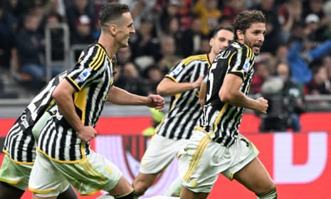 Manuel Locatelli (right) celebrates his goal during a Serie A match between Milan and Juventus at the San Siro