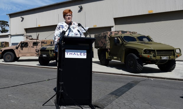 Then-Defence Minister Marise Payne in front of Hawkei vehicles.