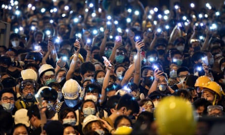 Protesters converging on Hong Kong’s police headquarters last week.