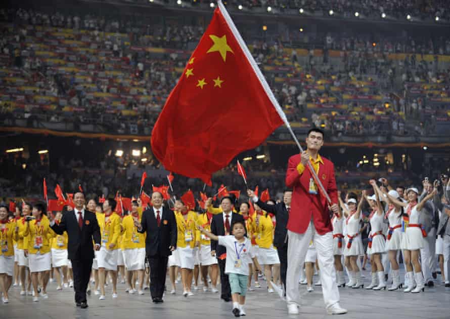 Basketball star Yao Ming leads the Chinese delegation at the opening ceremony in 2008.