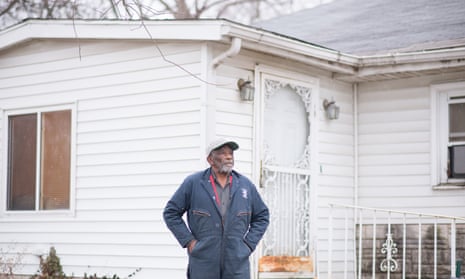Earlie Fuse stands outside his home in the Piat Place neighborhood in Centreville. Over a month ago a rain event flooded the neighborhood, collapsing a basement wall he repaired in October.