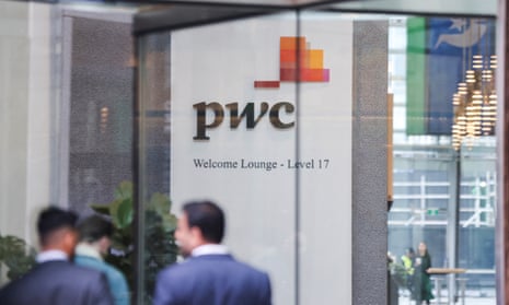 PricewaterhouseCoopers logo in an office.