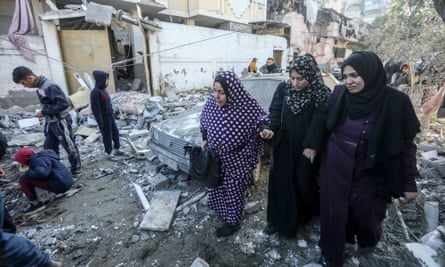 Women at the site of an airstrike in Rafah, Gaza, 3 February 2024