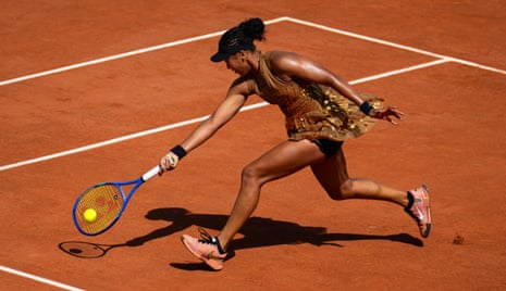Naomi Osaka digs out a return to Donna Vekic.