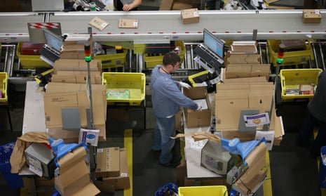 FILE: Workers At Amazon’s UK Warehouses Told To Work Overtime To Tackle Huge Demand Due To The Coronavirus Pandemic<br>HEMEL HEMPSTEAD, ENGLAND - DECEMBER 05: Parcels are prepared for dispatch at Amazon’s warehouse on December 5, 2014 in Hemel Hempstead, England. In the lead up to Christmas, Amazon is experiencing the busiest time of the year. (Photo by Peter Macdiarmid/Getty Images) FILE: Workers At Amazon’s UK Warehouses Told To Work Overtime To Tackle Huge Demand Due To The Coronavirus Pandemic.