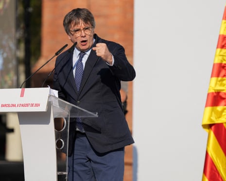 Catalonia’s exiled separatist leader Carles Puigdemont delivers a speech on stage as his hardline separatist JxCAT party has scheduled a welcome ceremony, ahead of an investiture vote at the Parliament of Catalonia, in Barcelona in 2024.