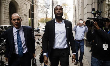 Rapper Meek Mill, center, accompanied by his defense attorney Brian Mcmonagle, arrives at the criminal justice center in Philadelphia this month.