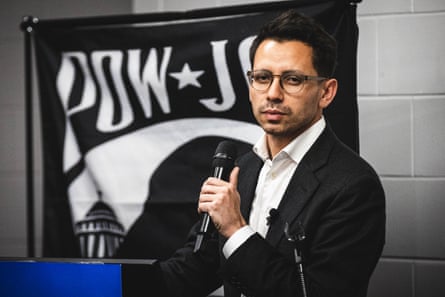 a man holds a microphone