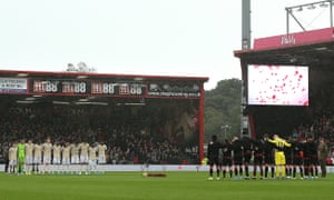 All those inside the ground observe a minutes silence for Remembrance Day.