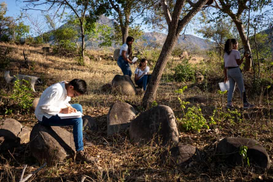 Children draw petroglyph symbols