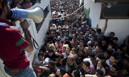 Migrants crammed into Kos stadium