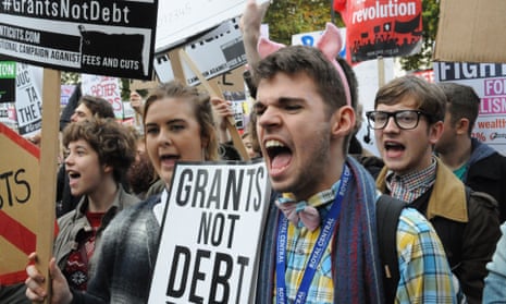 Students rage against tuition fee cuts during a protest outside Downing Street, London.