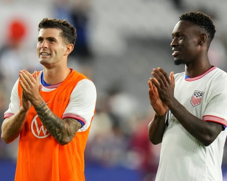 United States’ Christian Pulisic (10) celebrates with teammate Folarin Balogun (20) following a friendly soccer match against Japan, Tuesday, Sept. 9, 2025, in Columbus, Ohio. (AP Photo/Jeff Dean)