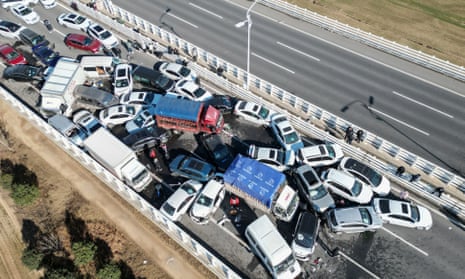 One person killed as 200 vehicles collide in fog on Chinese bridge | China | The Guardian