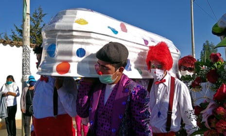 The funeral in Huancayo, Peru, of William Rojas, a clown known as Chupetin, who died of the virus. 