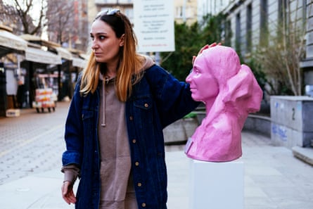 Erka pictured with one of her busts.