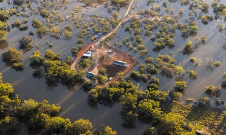 An aerial view of a property surrounded by flood water on December 09, 2022 in Louth, Australia