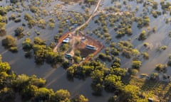 Aerial view of a rural property isolated by flood waters
