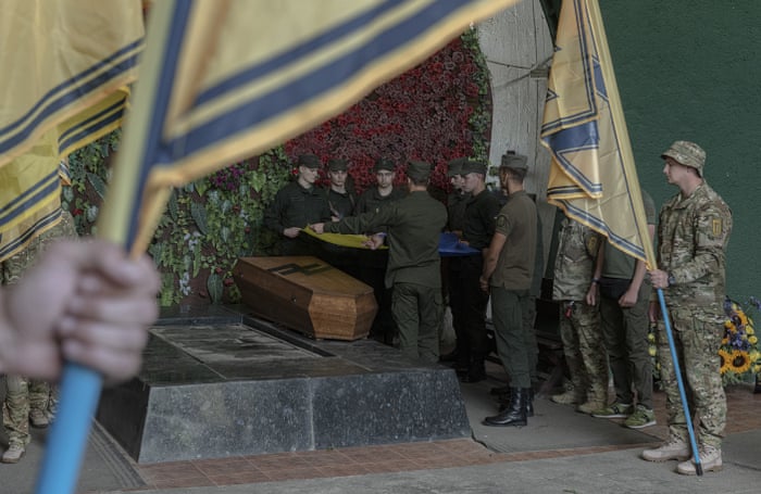 Russia-Ukraine war: Kyiv and Moscow sign deal to allow grain exports from blockaded Black Sea ports – live 8 Soldiers of the Azov regiment pay a last tribute to a serviceman killed in a battle in a city crematorium in Kyiv. The battalion retains some far-right affiliations and has been criticised for its use of insignia which echoes neo-Nazi imagery.