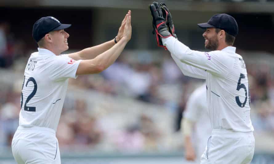 England’s Matthew Potts celebrates with Ben Foakes after taking a catch to dismiss New Zealand’s Kyle Jamieson off the bowling of Jimmy Anderson.