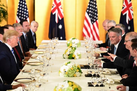 US President Donald Trump (L) attends a dinner with Australia’s Prime Minister Scott Morrison (R) in Osaka on June 27, 2019, ahead of the G20 Osaka Summit.