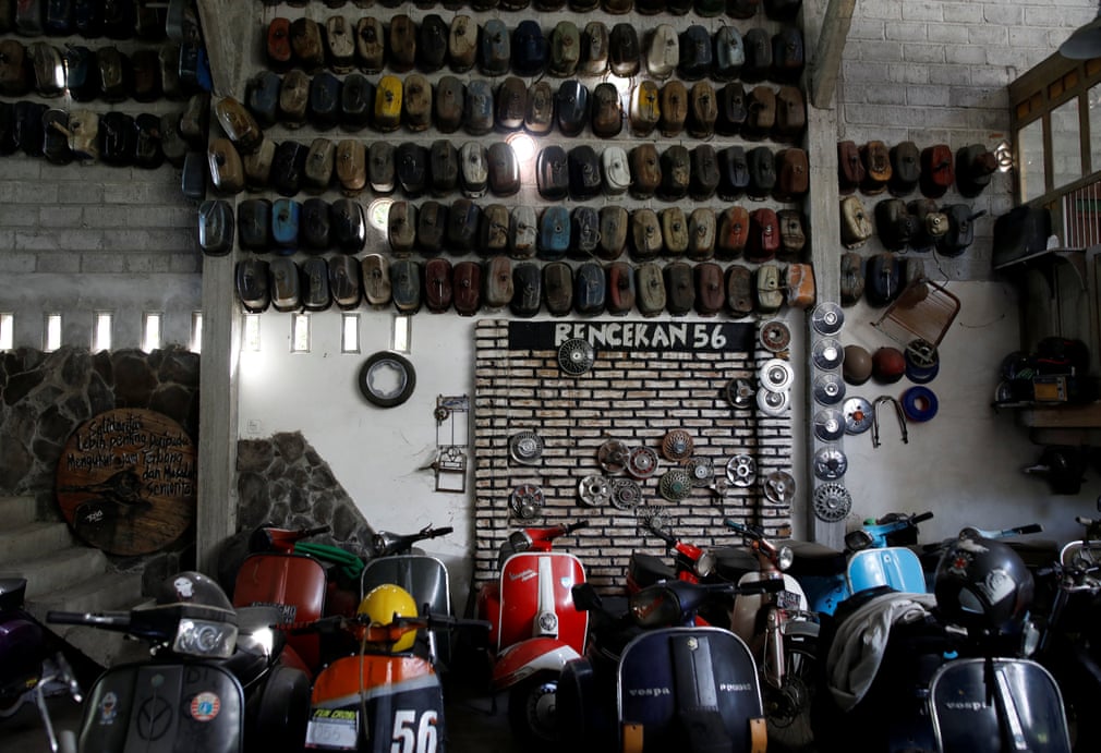 Vespas are displayed in a club and workshop in Kediri | The Guardian