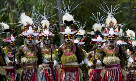 Men perform a traditional dance in Papua New Guinea.