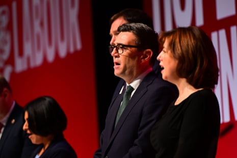 Andy Burnham and Lucy Powell onstage singing at the end of the Labour conference, which always concludes with renditions of the Red Flag and Jerusalem.