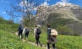 Mountain hiking in France by Rhiannon Batten Rhiannon and family with guide Bernard walking up to refuge Dormillouse, France