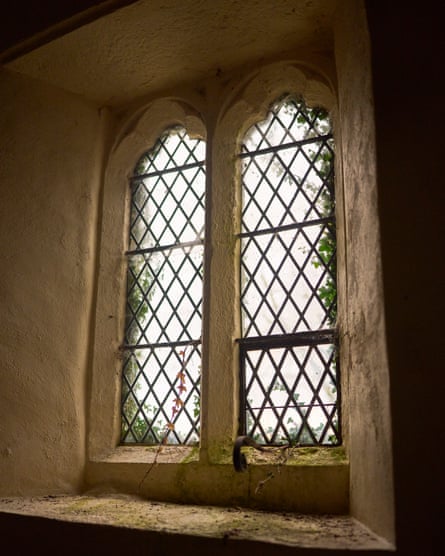 Old church window with ivy at the edges