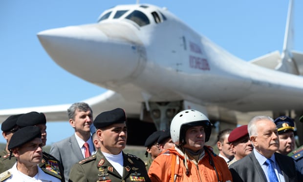 The Venezuelan defence minister, Vladimir Padrino López, second left, is pictured after the arrival of two Russian Tupolev Tu-160 strategic long-range heavy supersonic bomber aircrafts in Caracas.