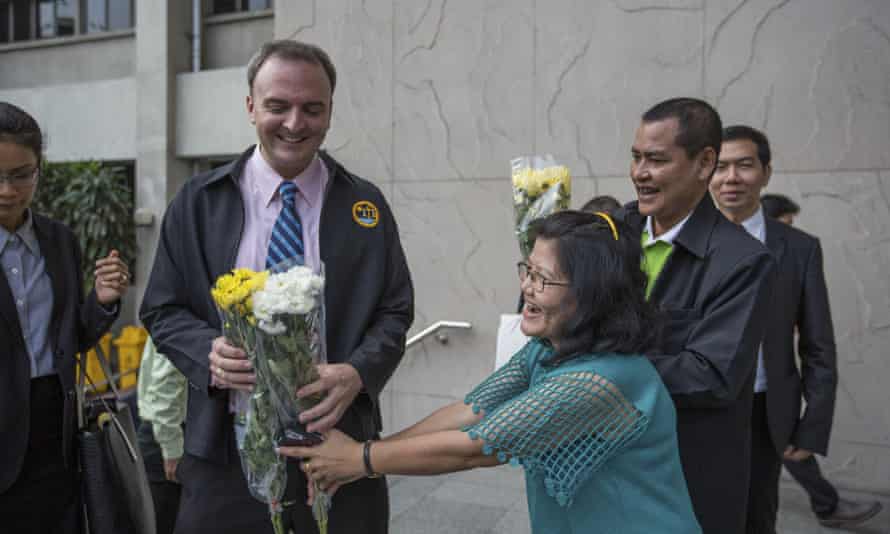 Andy Hall receiving flowers outside the Bangkok South Criminal Court in January 2016.