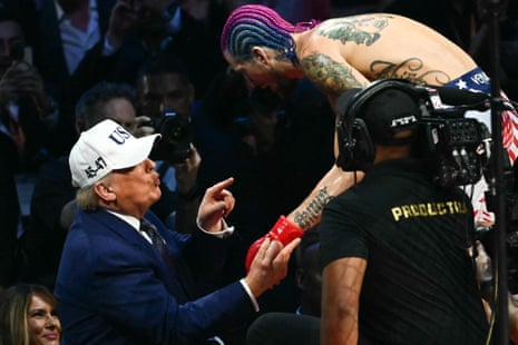 Sean O’Malley speaks with Donald Trump after Sunday’s TKO win.
