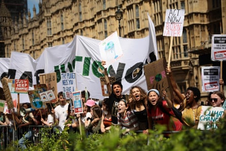Students taking part in a climate rally in Parliament Square, London, in May 2019, urging the government to declare a climate emergency and take action