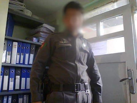 Photo of man being referred to as Hamid with his face blurred wearing police uniform