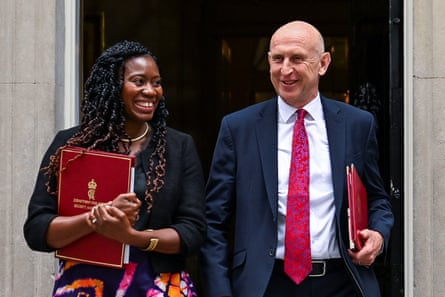 The energy security and net zero secretary, Miatta Fahnbulleh, and the chancellor of the exchequer, John Healey, leave No 10 after the first cabinet meeting with Andy Burnham, 21 July 2026.