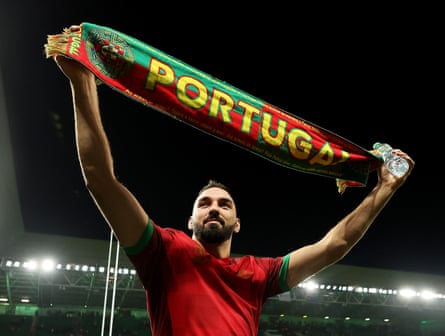 Steevy Cerqueira of Portugal acknowledges the fans whilst holding a scarf
