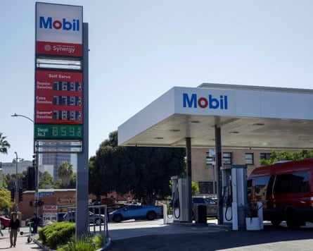 Gas prices above $7 a gallon for regular gasoline and $8 a gallon for diesel are displayed at a Mobil gas station.